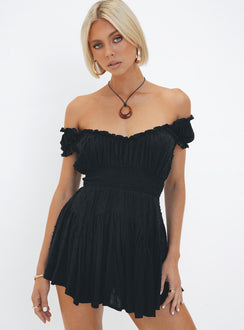 Black mini dress Shirred waistband Ruffle detailing Elasticated neck and sleeves Can be worn on or off shoulder Built in shorts Layered ruffle hem Fully lined