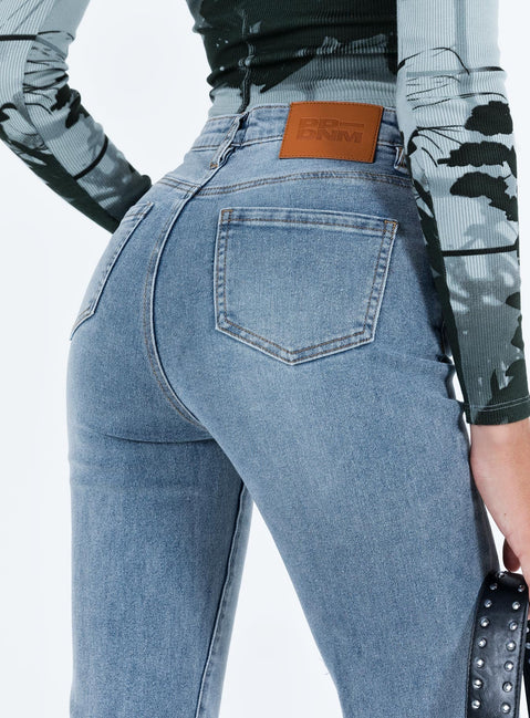 Jeans Mid wash denim Flared fit Front button & zip fastening  Belt looped waist Classic five pocket design Split hem Some stretch Unlined 