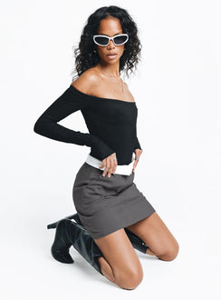 Mini skirt Folded waist detail Zip and clasp fastening Twin hip pockets