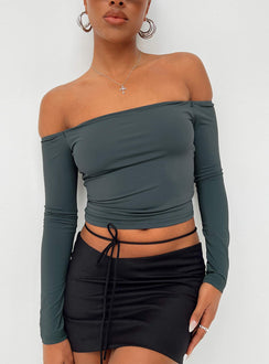 Black mini skirt Low rise Asymmetric waist Tie fastening at waist Invisible zip fastening at side