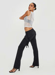 Pants Low-waisted, frill detail-lettuce trim on waits, slightly flared  Elasticated waist 
