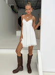 White Mini dress V neckline, dual adjustable straps, mesh material, ruching & lace trim detail on bust, raw edge hem