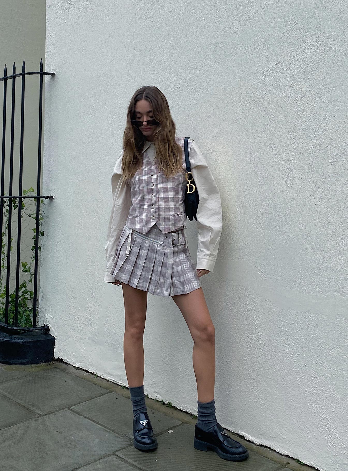 Mini Skirt plaid print Plaid print Double buckle fastening at waist Faux zip around waist Pleated design Side slit