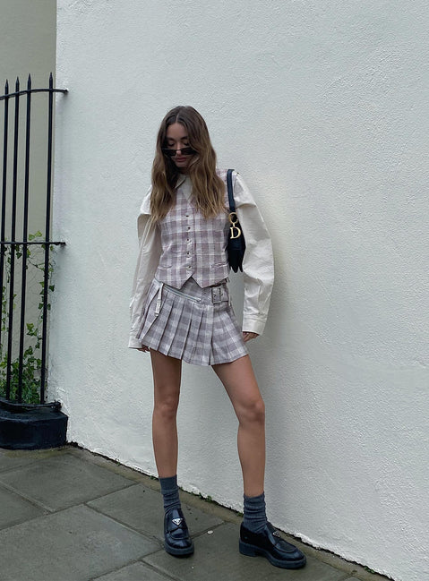 Mini Skirt plaid print Plaid print Double buckle fastening at waist Faux zip around waist Pleated design Side slit